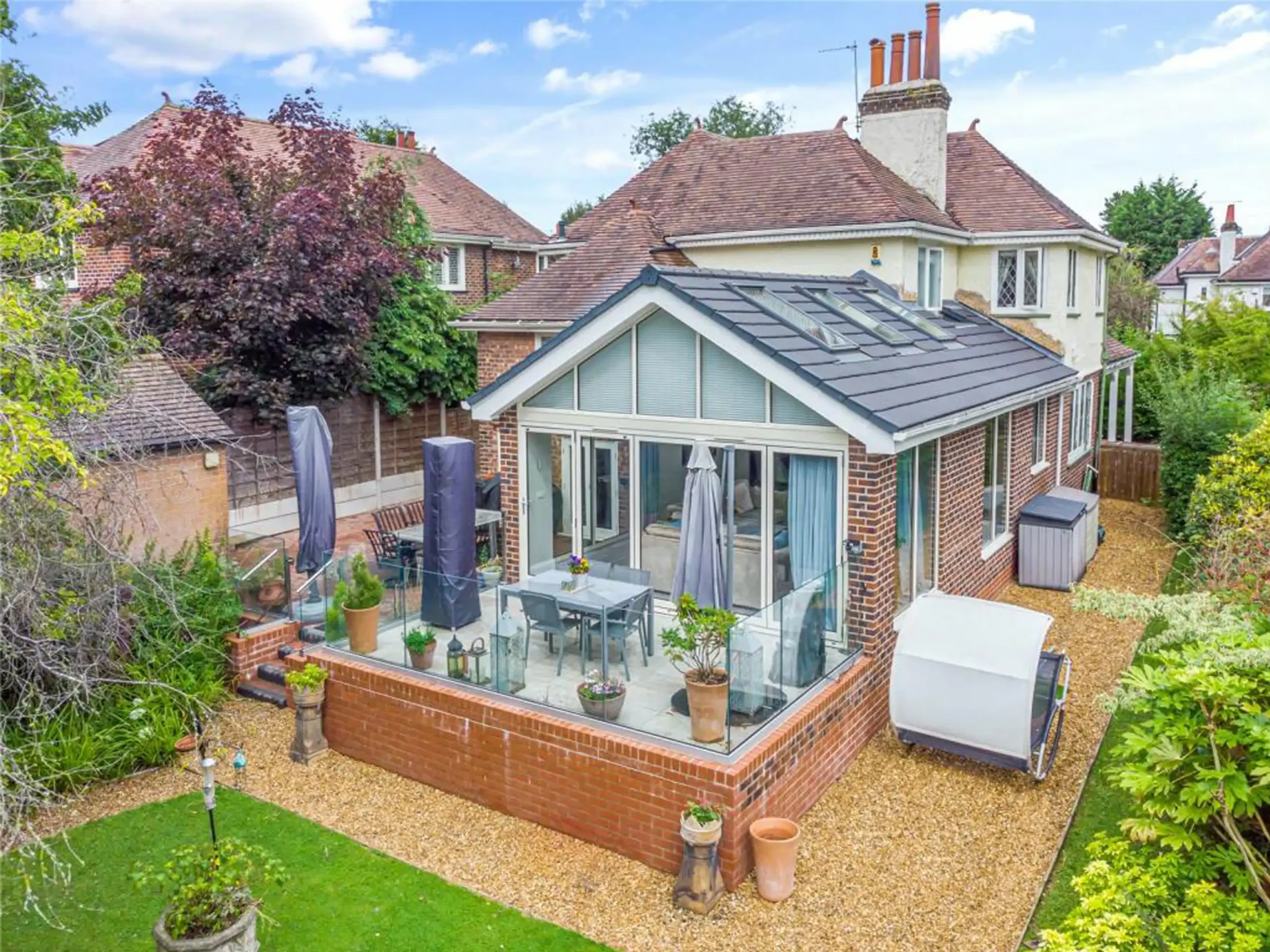 Side view of a home extension with a modern design in Hale, Cheshire.